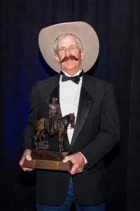 RW shows off the Chester A Reynolds Award